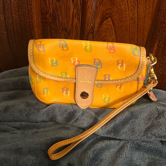 Dooney & Bourke Handbags - Dooney & Bourke Orange DB Monogram Wristlet, removable strap, good/excellent